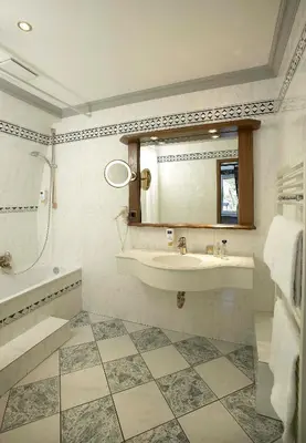 Ein Badezimmer in der Unterkunft AKZENT Hotel Berg's Alte Bauernschänke- Wellness und Wein