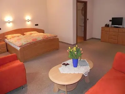 Ein Bett oder Betten in einem Zimmer der Unterkunft Gästehaus Freimuth