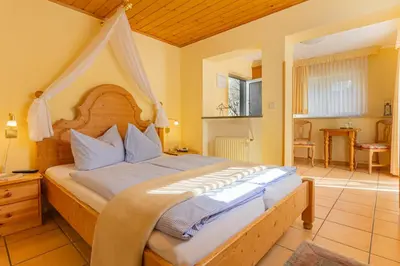 Ein Bett oder Betten in einem Zimmer der Unterkunft Hotel Villa Tummelchen