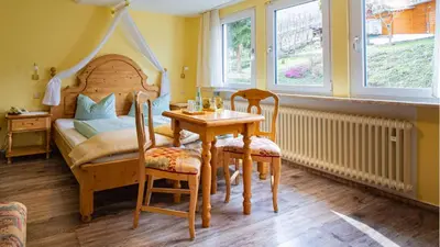 Ein Sitzbereich in der Unterkunft Hotel Villa Tummelchen