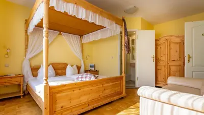 Ein Bett oder Betten in einem Zimmer der Unterkunft Hotel Villa Tummelchen