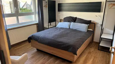 Ein Bett oder Betten in einem Zimmer der Unterkunft Haus Moselliebe B&B