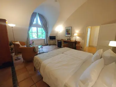Ein Bett oder Betten in einem Zimmer der Unterkunft Wein- und Landhaus S A Prüm