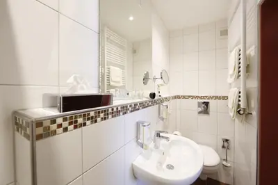 Ein Badezimmer in der Unterkunft Hotel Karl Noss