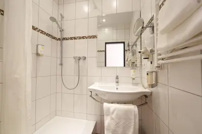 Ein Badezimmer in der Unterkunft Hotel Karl Noss