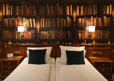 Ein Bett oder Betten in einem Zimmer der Unterkunft Hotel Germania