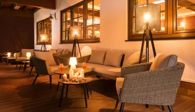 Ein Sitzbereich in der Unterkunft Weinhotel Sonnenschein