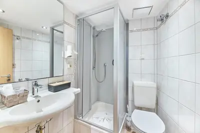 Ein Badezimmer in der Unterkunft Hotel Weinhof