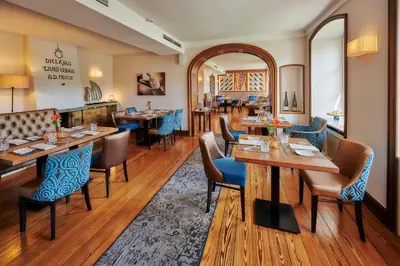 Ein Sitzbereich in der Unterkunft Weinromantikhotel Richtershof