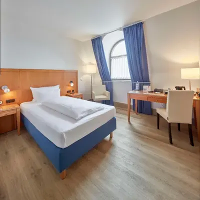 Ein Bett oder Betten in einem Zimmer der Unterkunft Best Western Hotel Trier City