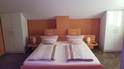 Ein Bett oder Betten in einem Zimmer der Unterkunft Anitas Ferienhaus