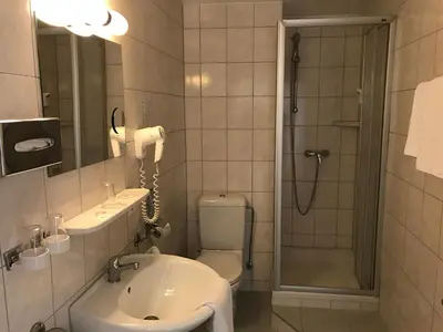 Ein Badezimmer in der Unterkunft Hotel Rheinlust