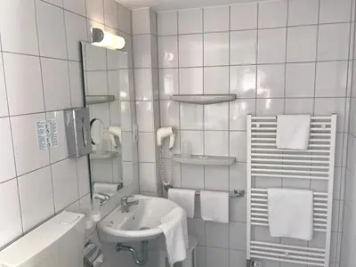 Ein Badezimmer in der Unterkunft Hotel Rheinlust