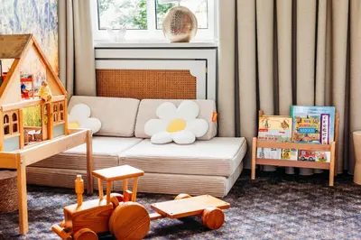 Ein Sitzbereich in der Unterkunft Landhotel Kauzenberg