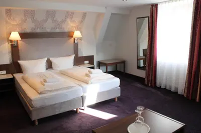 Ein Bett oder Betten in einem Zimmer der Unterkunft Beim Weinbauer