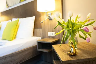 Ein Bett oder Betten in einem Zimmer der Unterkunft Hotel Aulmann