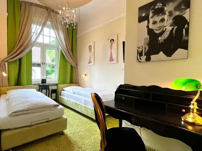 Ein Bett oder Betten in einem Zimmer der Unterkunft PARK VILLA zentral am Mittelrhein Zimmer&Apartments Self check in Aparthotel