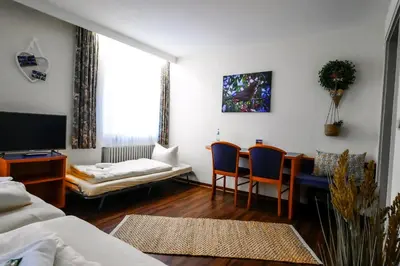 Ein Bett oder Betten in einem Zimmer der Unterkunft Hotel Stadt Daun