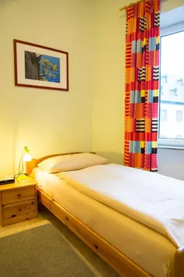 Ein Bett oder Betten in einem Zimmer der Unterkunft Pension bei Schinderhannes und Julchen