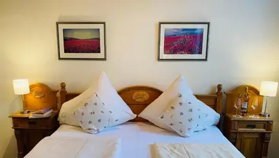 Ein Bett oder Betten in einem Zimmer der Unterkunft Hotel Hieronimi