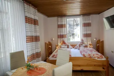 Ein Bett oder Betten in einem Zimmer der Unterkunft Pension Haus Andreas
