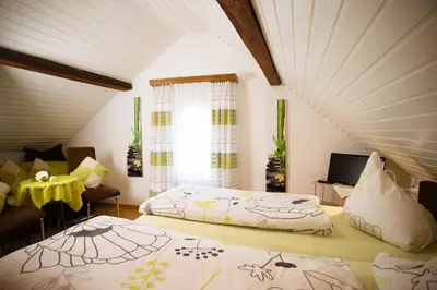 Ein Bett oder Betten in einem Zimmer der Unterkunft Pension Haus Andreas