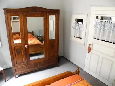 Ein Bett oder Betten in einem Zimmer der Unterkunft Altes Winzerhaus