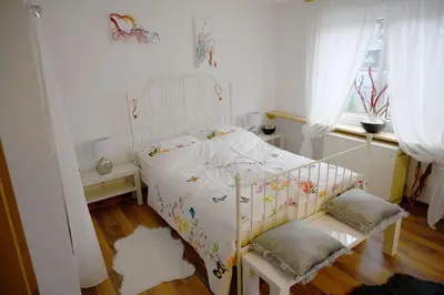 Ein Bett oder Betten in einem Zimmer der Unterkunft Haus Alfina