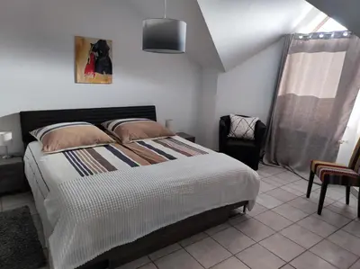 Ein Bett oder Betten in einem Zimmer der Unterkunft Ferienwohnung Lore