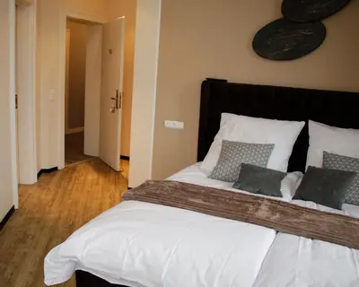 Ein Bett oder Betten in einem Zimmer der Unterkunft Z&B Hotel