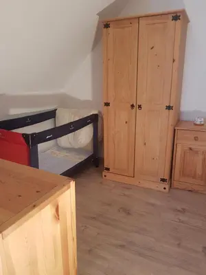 Ein Bett oder Betten in einem Zimmer der Unterkunft Komfort Ferienhaus FEWO70