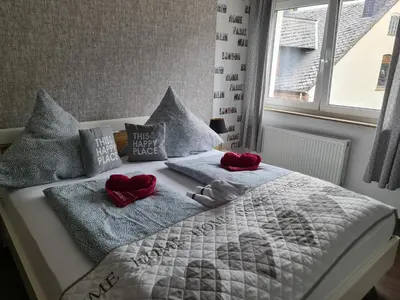 Ein Bett oder Betten in einem Zimmer der Unterkunft Schöne 3 Zimmer Wohnung