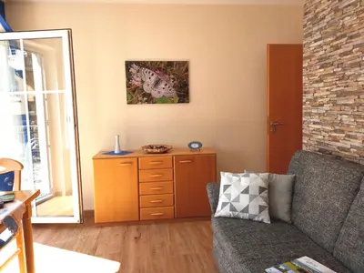 Ein Sitzbereich in der Unterkunft Ferienwohnung Schneemann