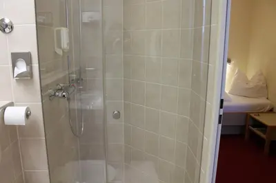 Ein Badezimmer in der Unterkunft Hotel Scholz