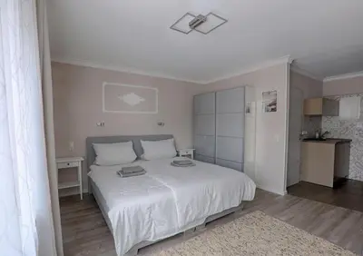 Ein Bett oder Betten in einem Zimmer der Unterkunft H-Apartments Bismarckstrasse