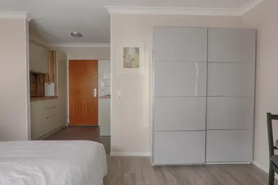 Ein Bett oder Betten in einem Zimmer der Unterkunft H-Apartments Bismarckstrasse