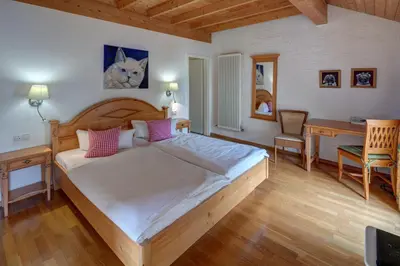 Ein Bett oder Betten in einem Zimmer der Unterkunft Hotel Leander