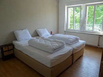 Ein Bett oder Betten in einem Zimmer der Unterkunft Haus Moezelblik - schöne Aussicht am Mosel