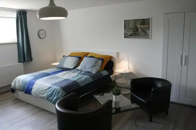 Ein Bett oder Betten in einem Zimmer der Unterkunft Eifel REBEIGE Gerolstein