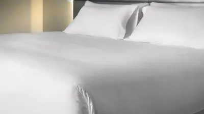 Ein Bett oder Betten in einem Zimmer der Unterkunft NH Bingen