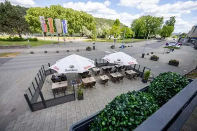 Ein Restaurant oder anderes Speiselokal in der Unterkunft Panorama Hotel Rheinkrone