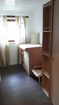 Ein Bett oder Betten in einem Zimmer der Unterkunft Ferienhaus Strunks ahl Häusje