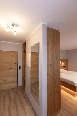 Ein Bett oder Betten in einem Zimmer der Unterkunft Hotel-Restaurant Weinhaus Grebel