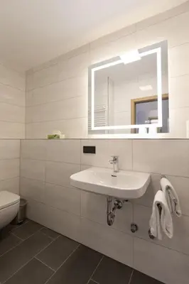 Ein Badezimmer in der Unterkunft Hotel-Restaurant Weinhaus Grebel