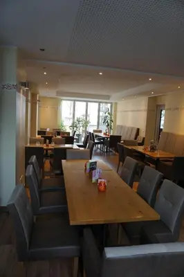 Ein Sitzbereich in der Unterkunft Hotel-Restaurant Weinhaus Grebel
