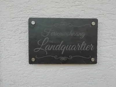 Ein Zertifikat, Auszeichnung, Logo oder anderes Dokument, das in der Unterkunft Ferienwohnung Landquartier ausgestellt ist
