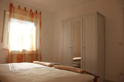 Ein Bett oder Betten in einem Zimmer der Unterkunft Ferienwohnung Weber-Rolinger