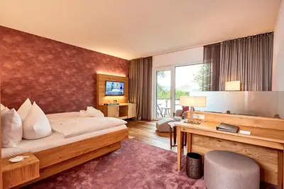 Ein Sitzbereich in der Unterkunft Hotel Villa Hügel