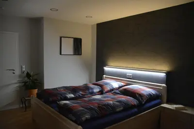 Ein Bett oder Betten in einem Zimmer der Unterkunft Ferienwohnung Arens