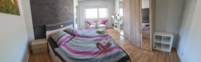 Ein Bett oder Betten in einem Zimmer der Unterkunft Ferienwohnung Arens